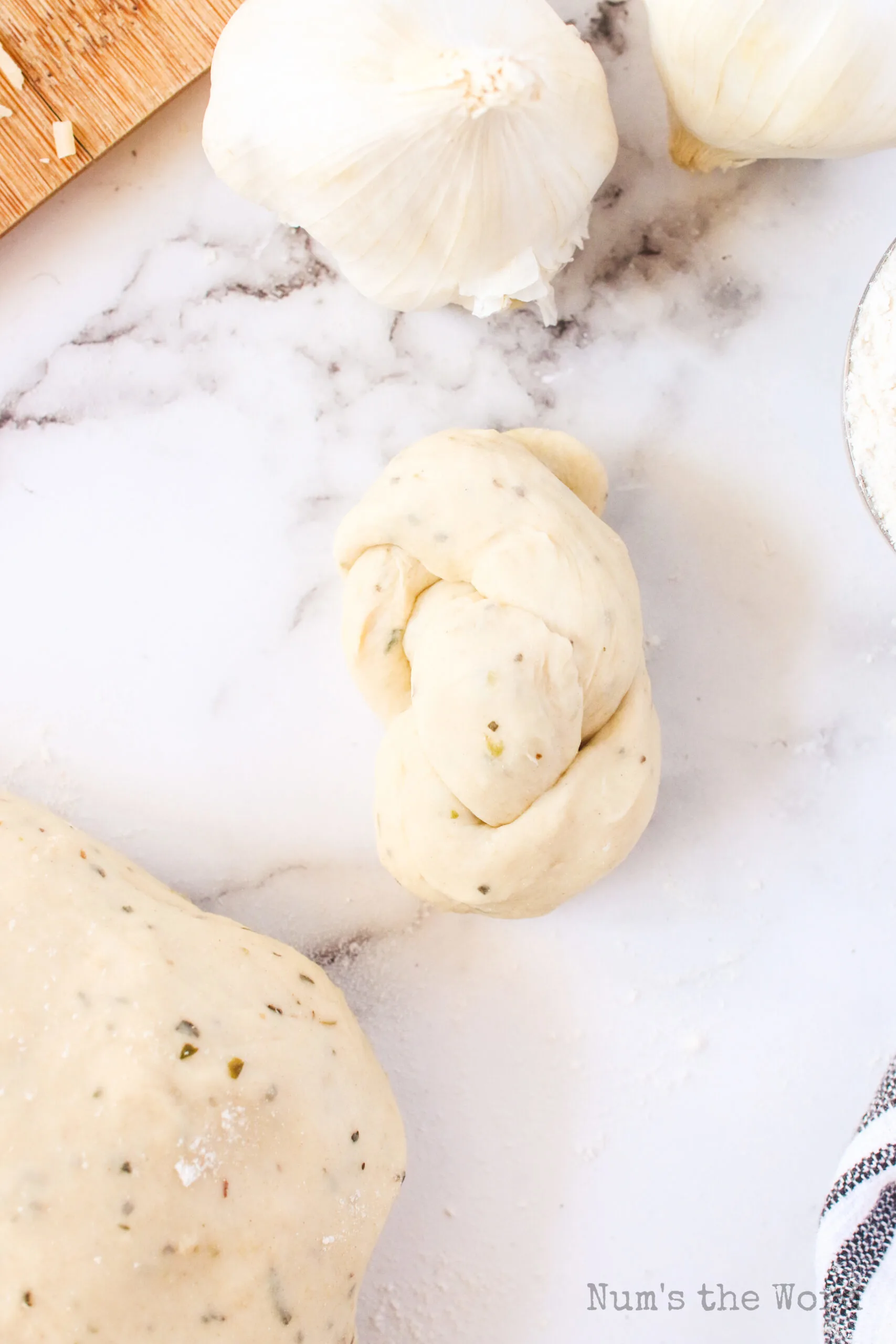 bread double knotted and ready for cookie sheet