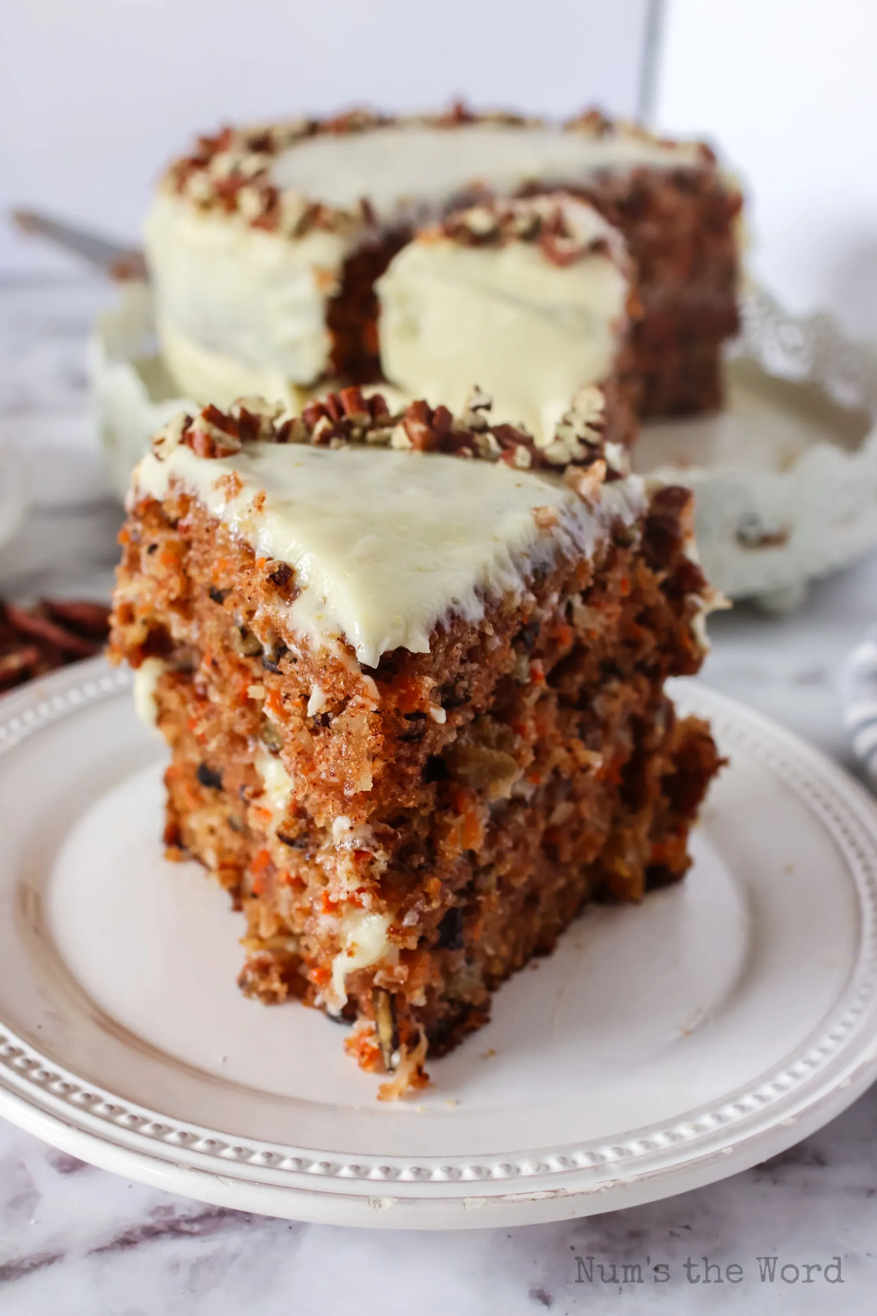 single slice of carrot cake on plate