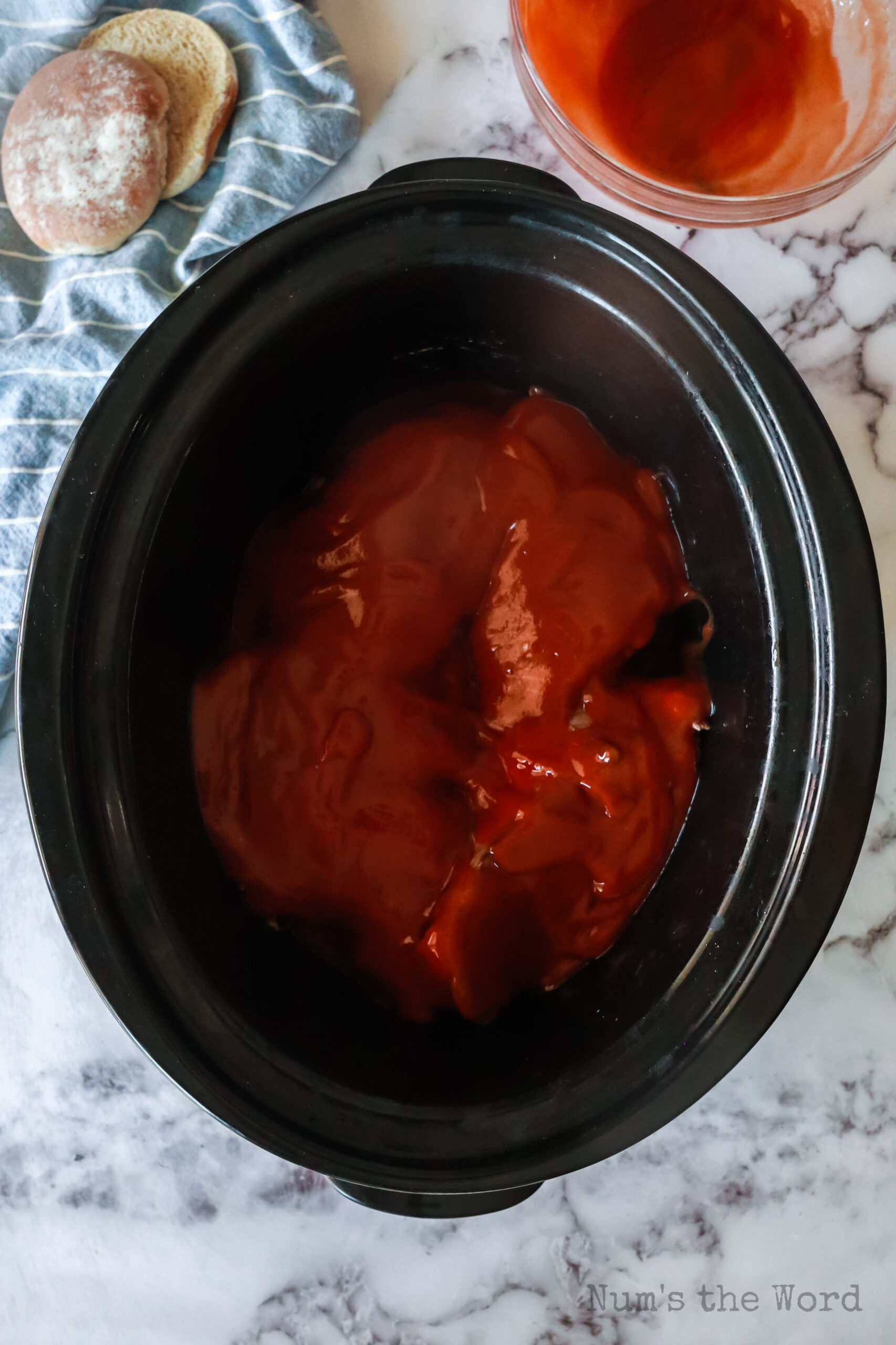 Ketchup sauce poured over beef
