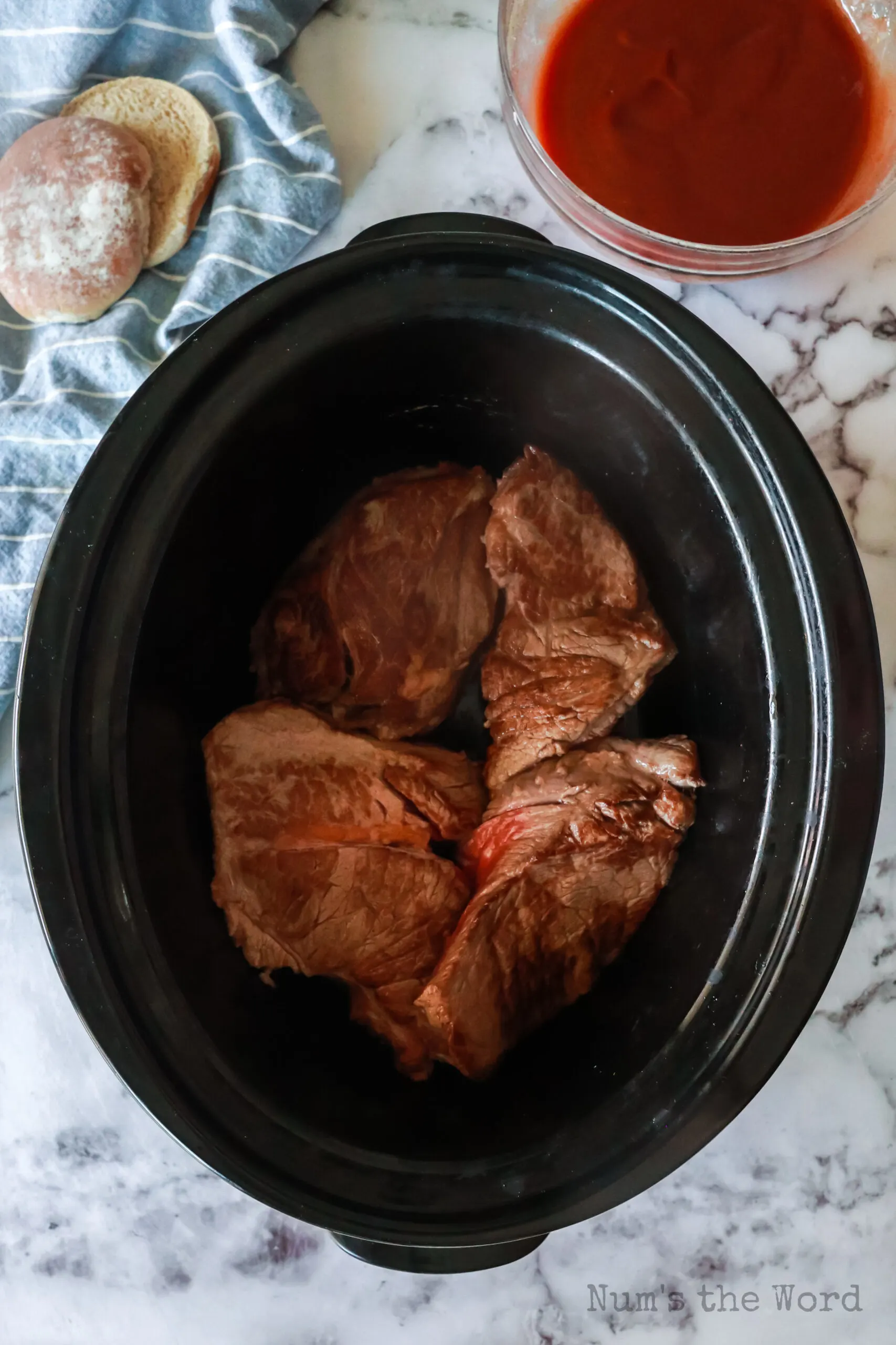4 pieces of chuck roast, seared and placed into the crock pot