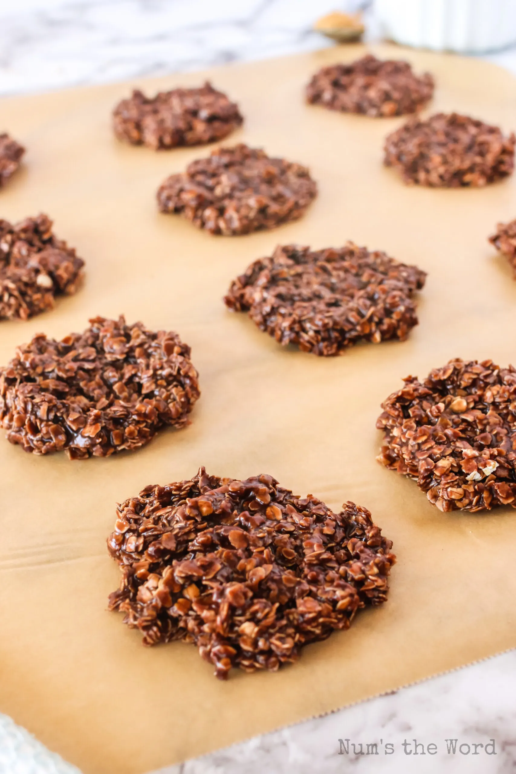 cookies laid out on parchment paper to dry