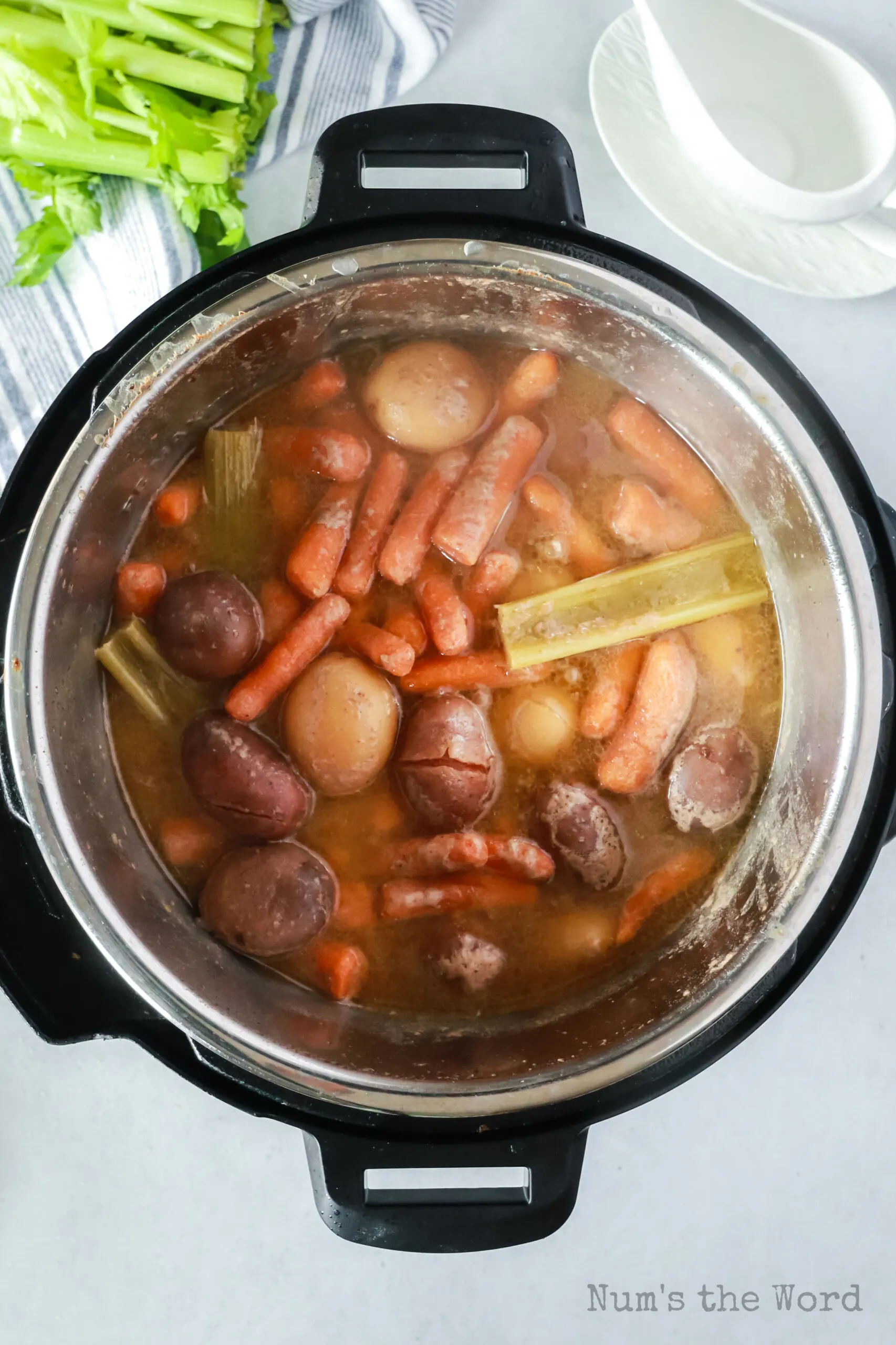 cooked veggies and pot roast in instant pot