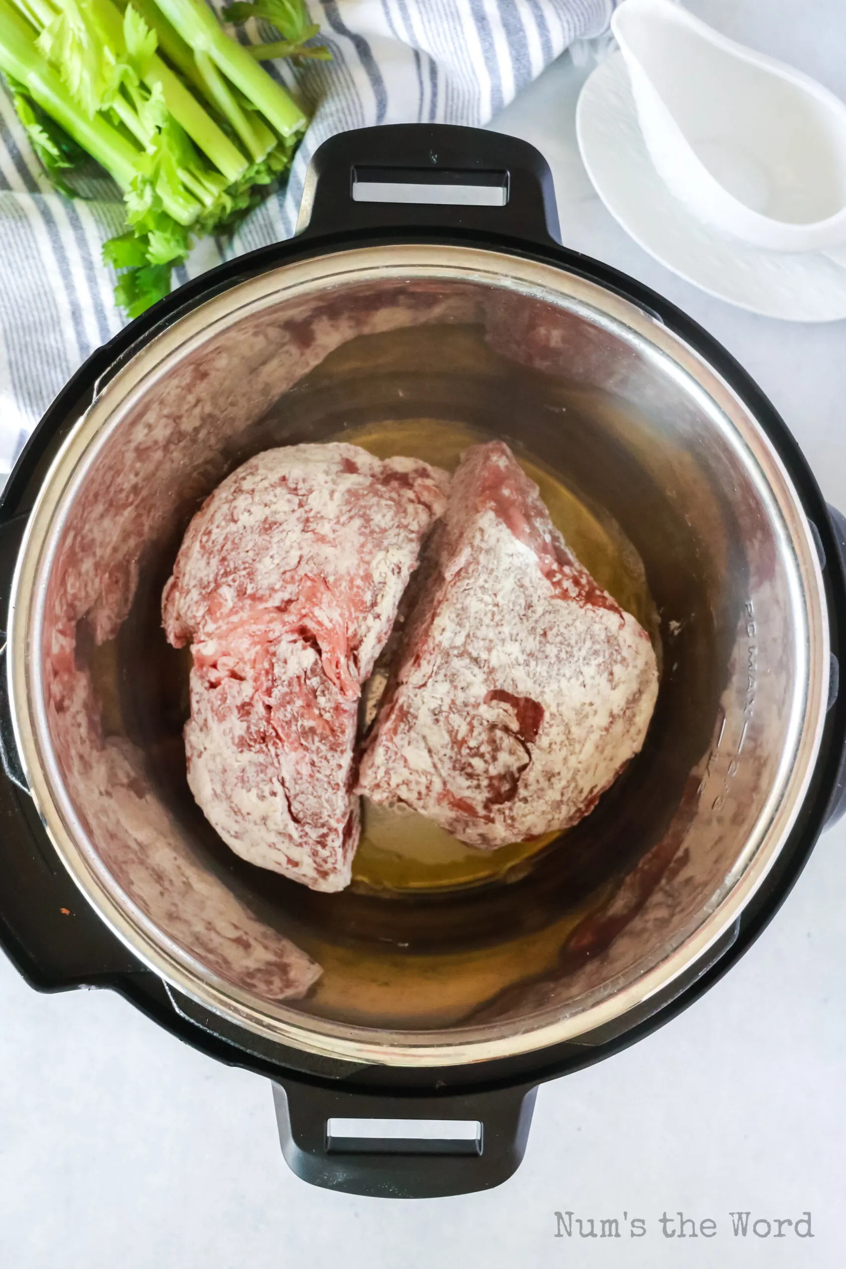 Searing slices of pot roast in the instant pot