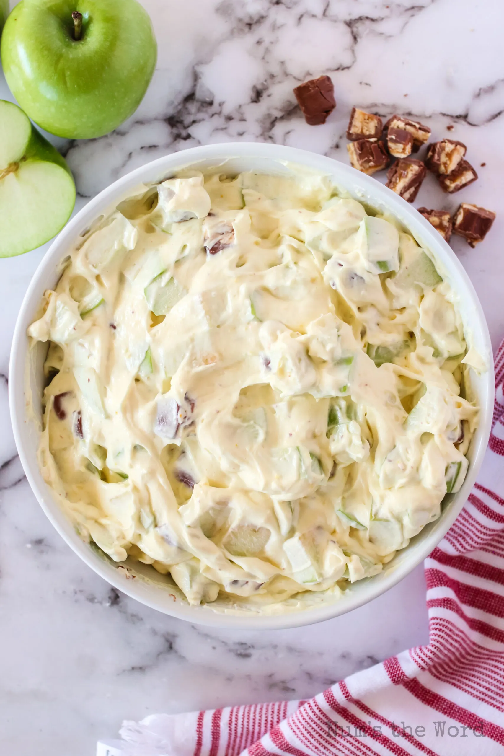 snickers salad mixed in bowl