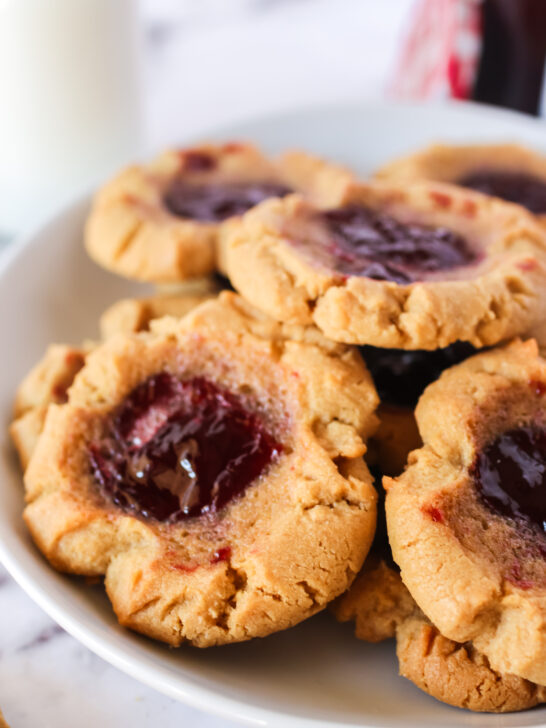 Plate full of baked peanut butter and jelly cookies