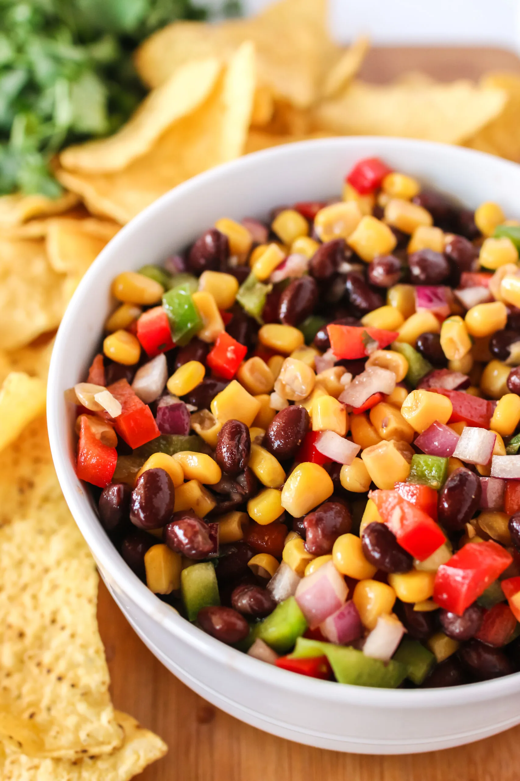 zoomed in side view of bowl of black bean salsa