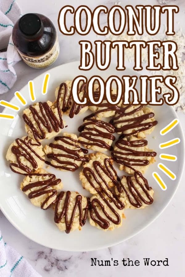 Main image for coconut butter cookies. Cookies are on a plate with a chocolate drizzle