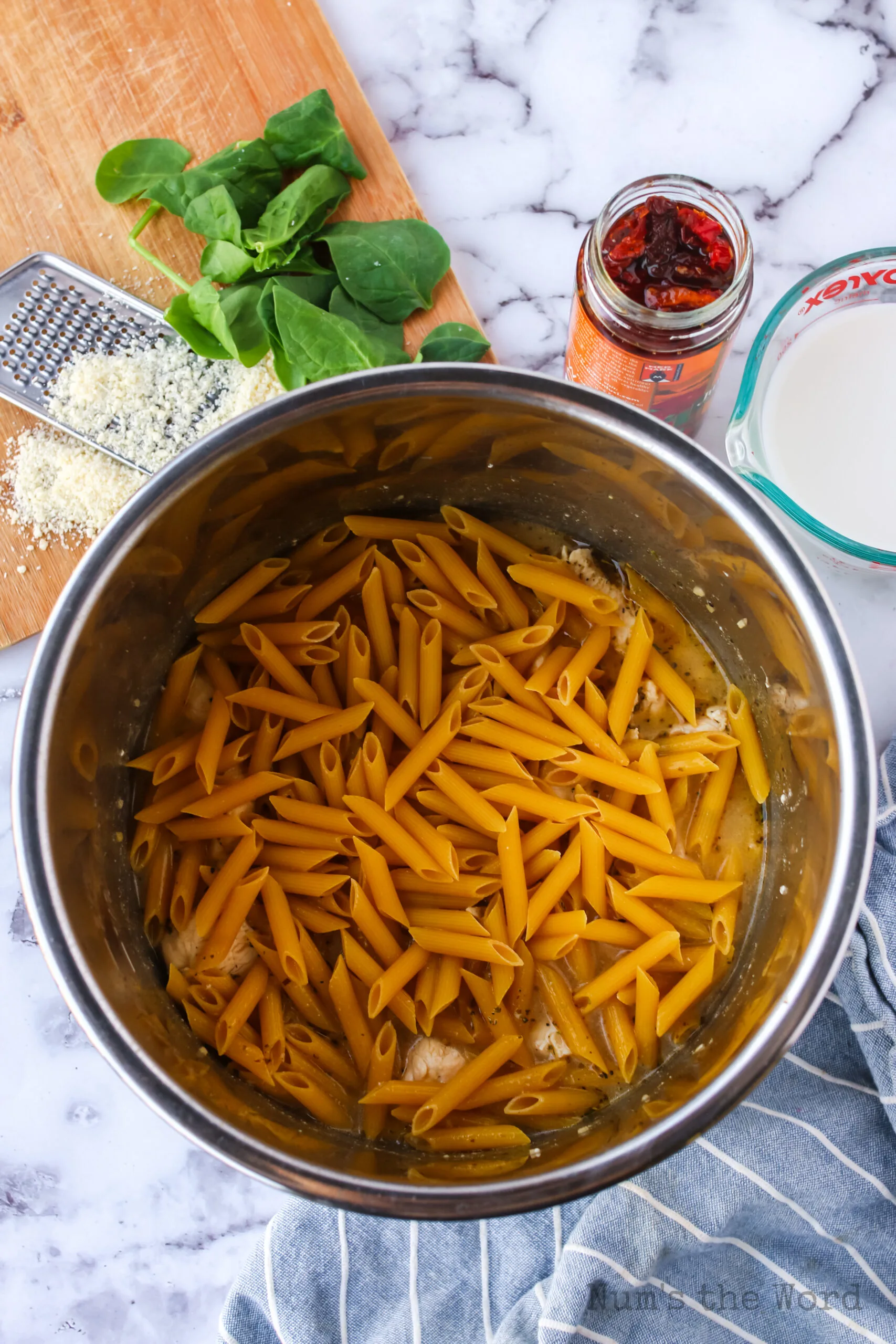 dry noodles laid on top of broth