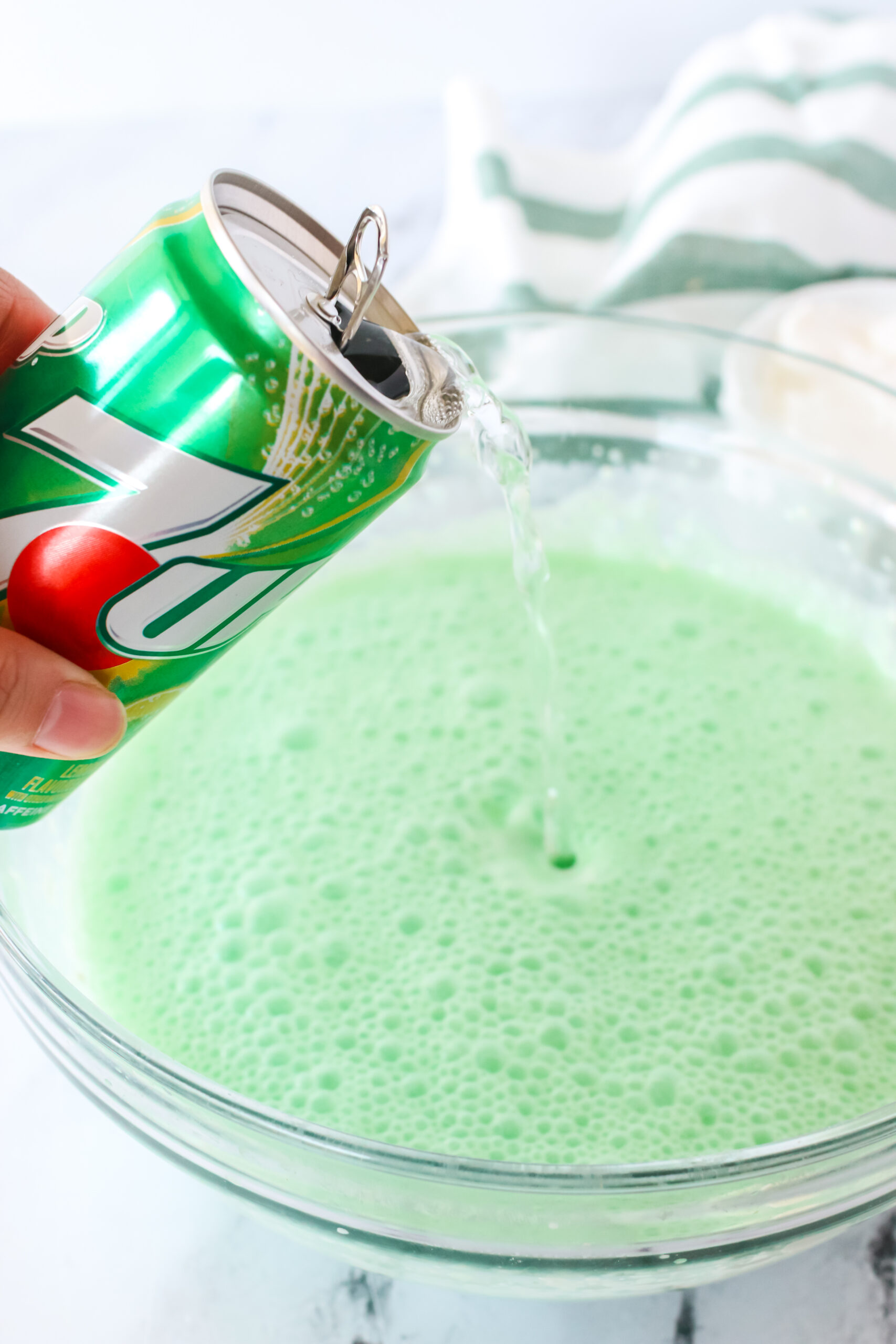 7 up being poured into jello mixture