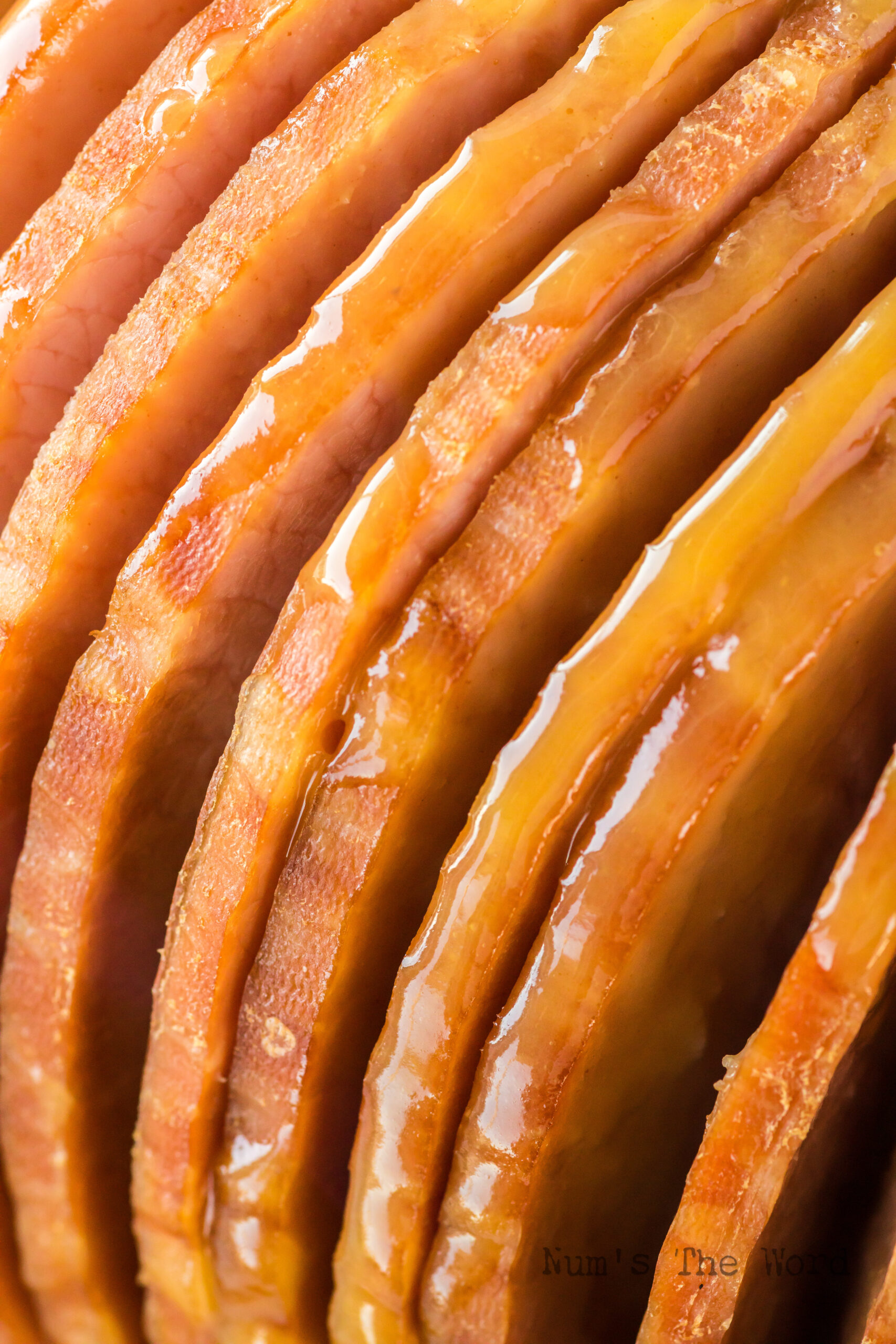 zoomed in image of ham slices with glaze