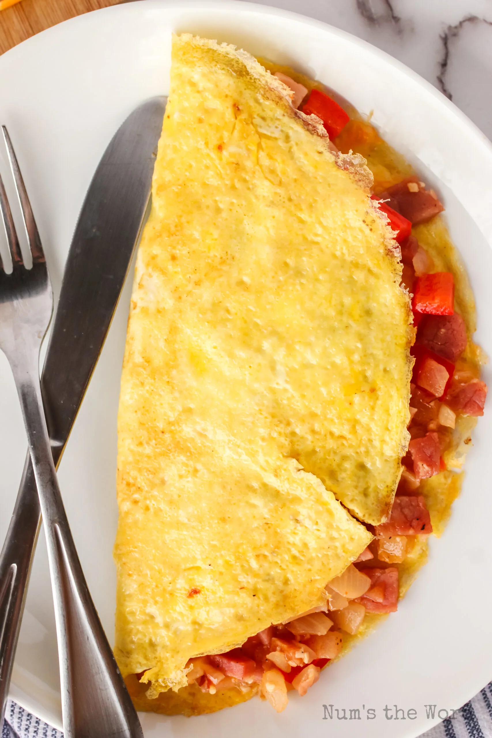 zoomed in image of denver omelette on a plate