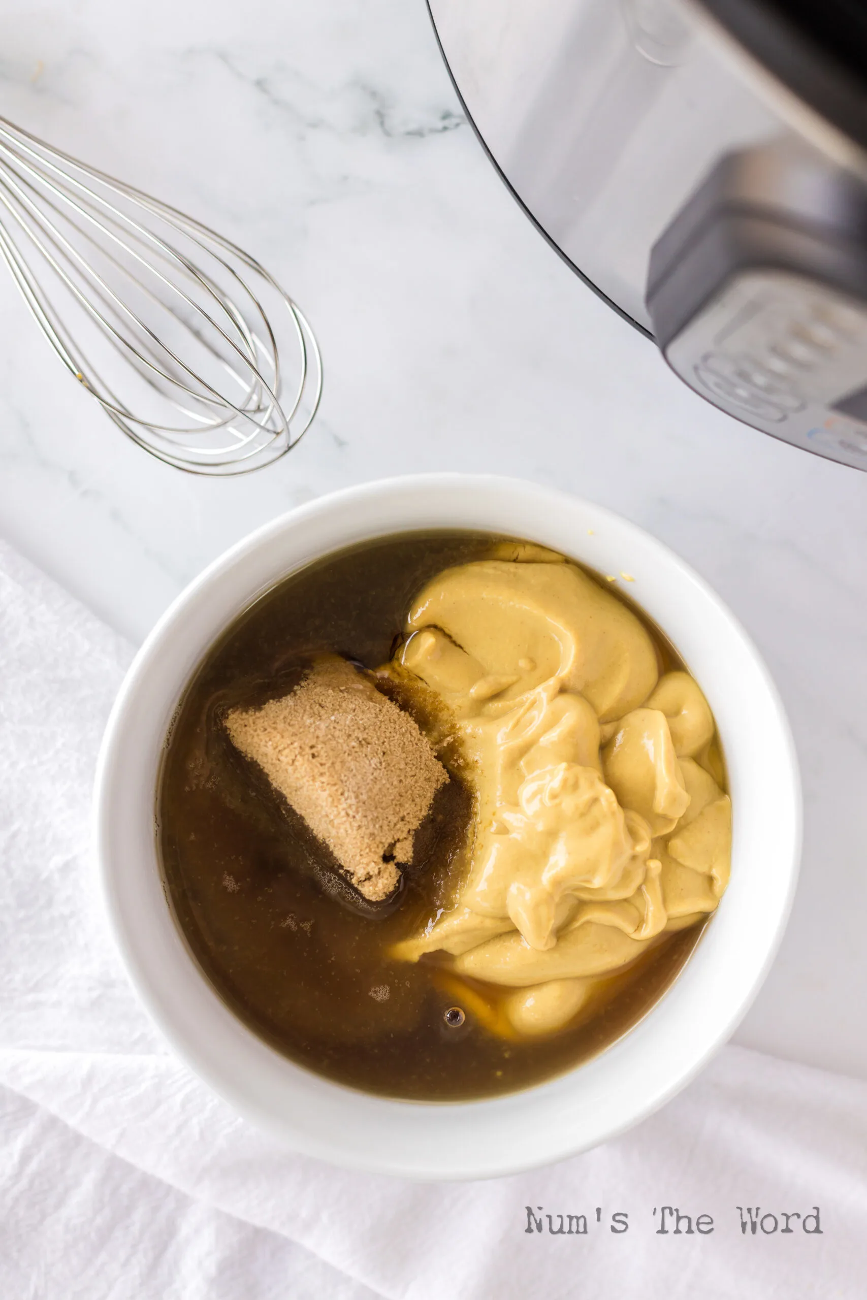 Brown sugar, honey and mustard in a bowl ready to be turned into a lovely glaze