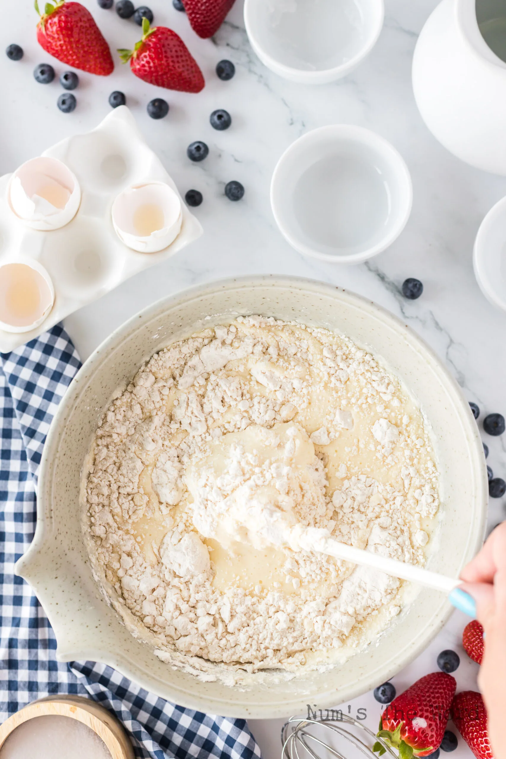 butter and flour added to bowl of pancake mix