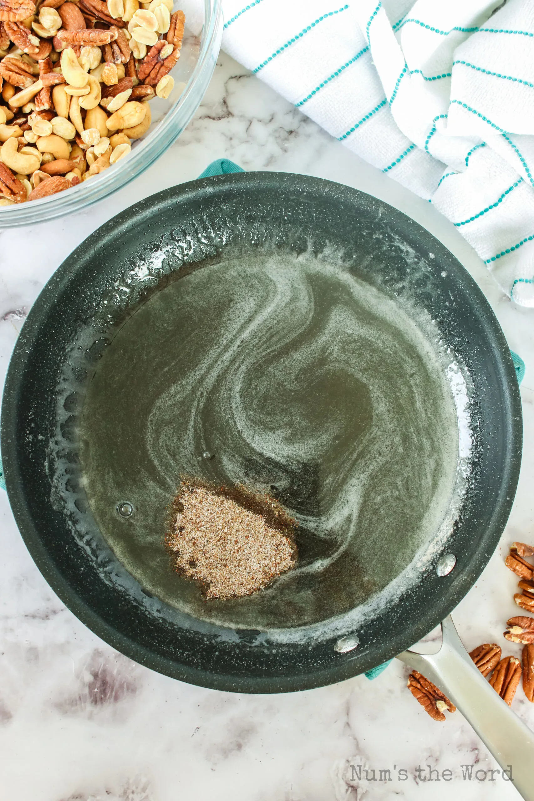 butter, sugar and water melted in a skillet, with seasoning added