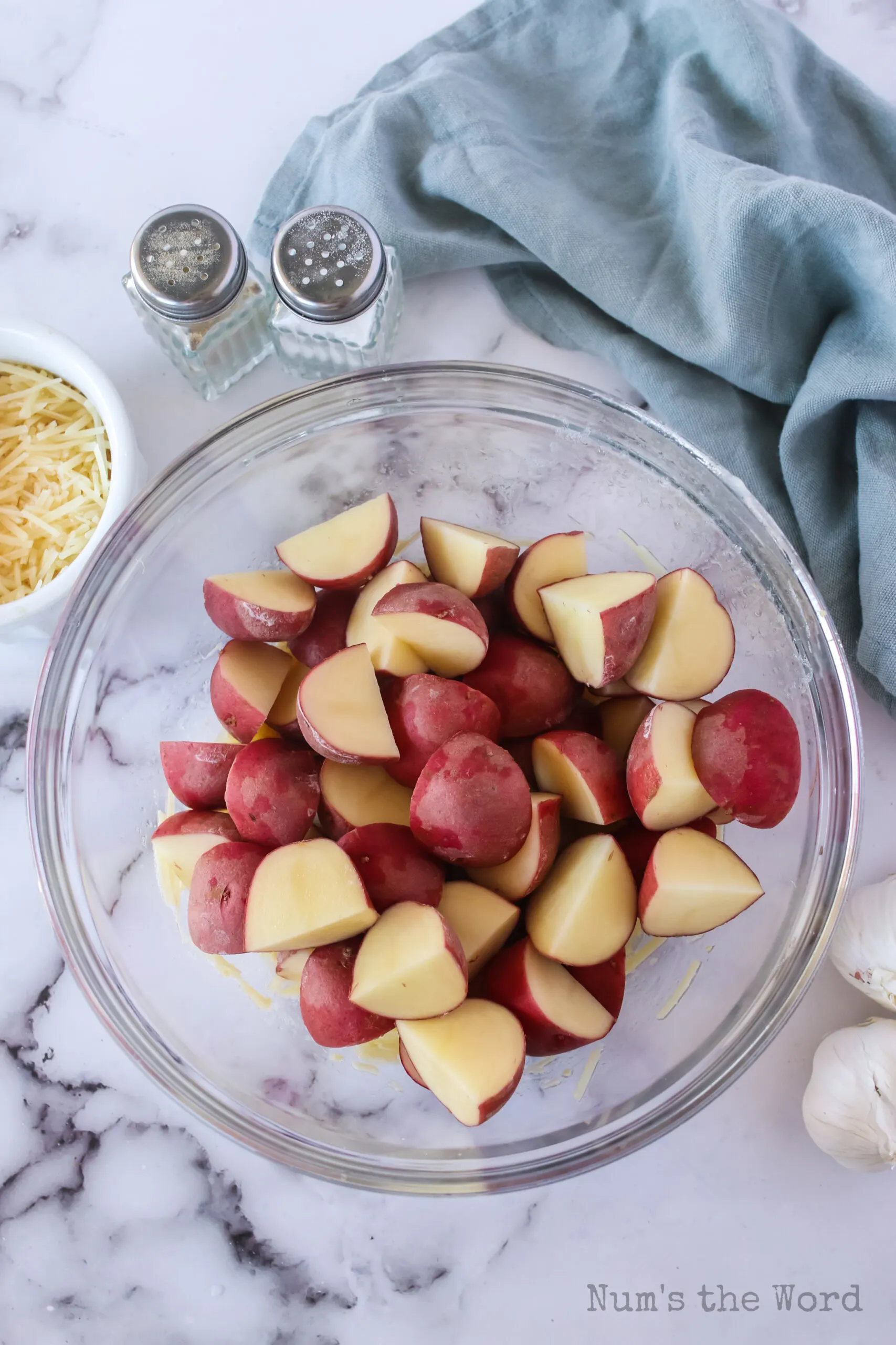 Red potatoes quartered in a bowl