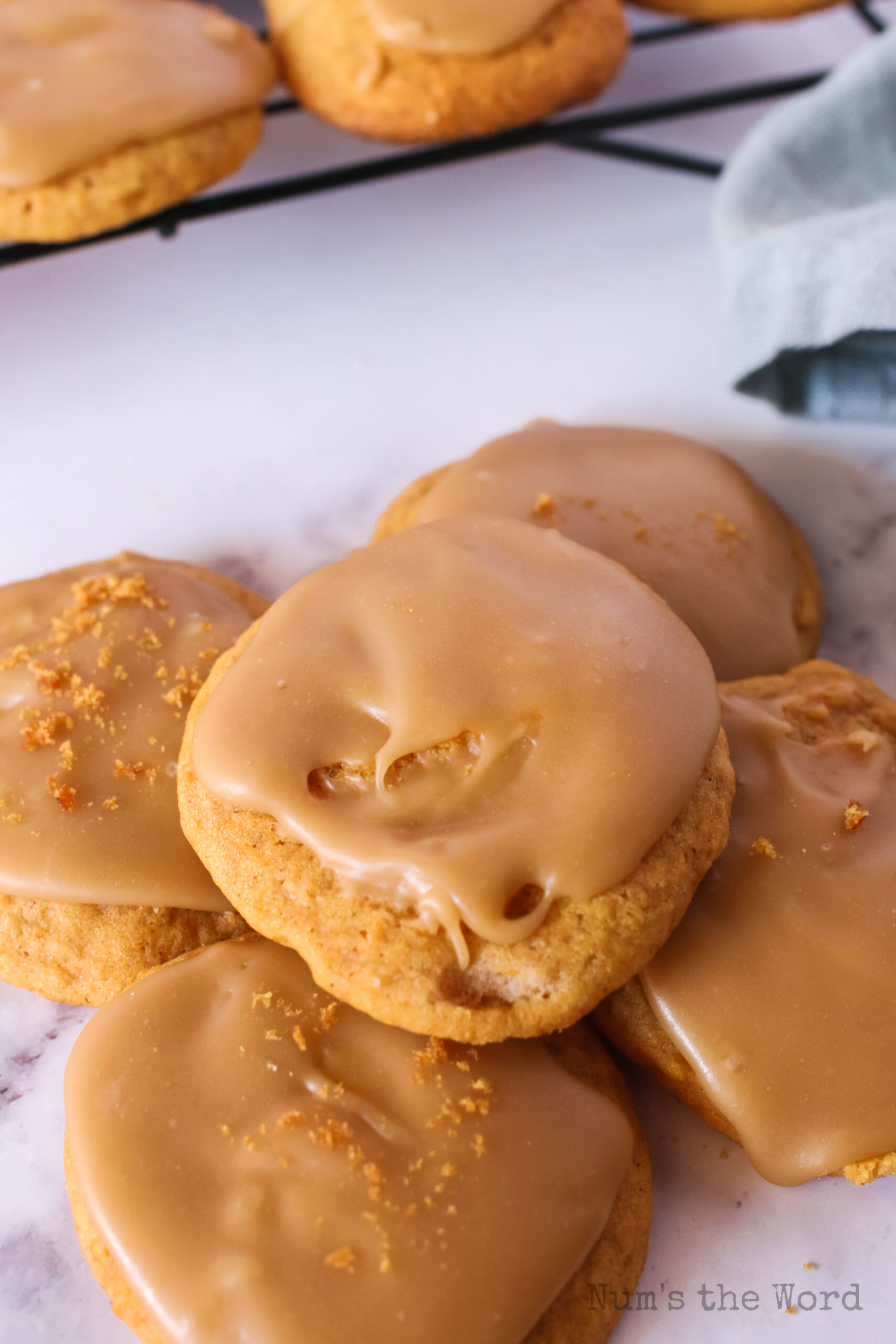 close up of brown sugar frosting on pumpkin cookies.