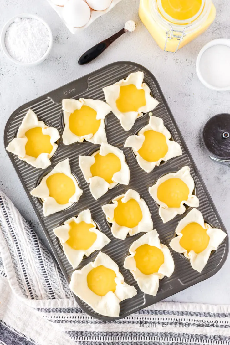 Lemon Curd added to puff pastry cups