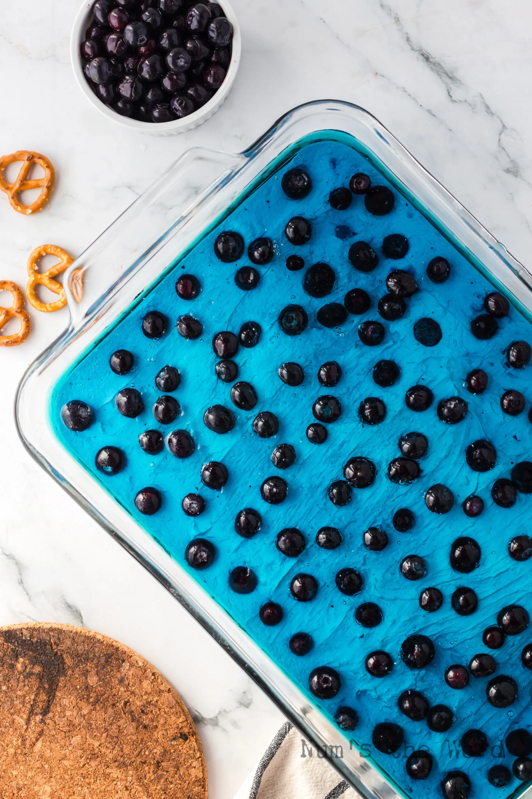 Jello Poured over blueberries and cream cheese mixture in casserole dish and chilled