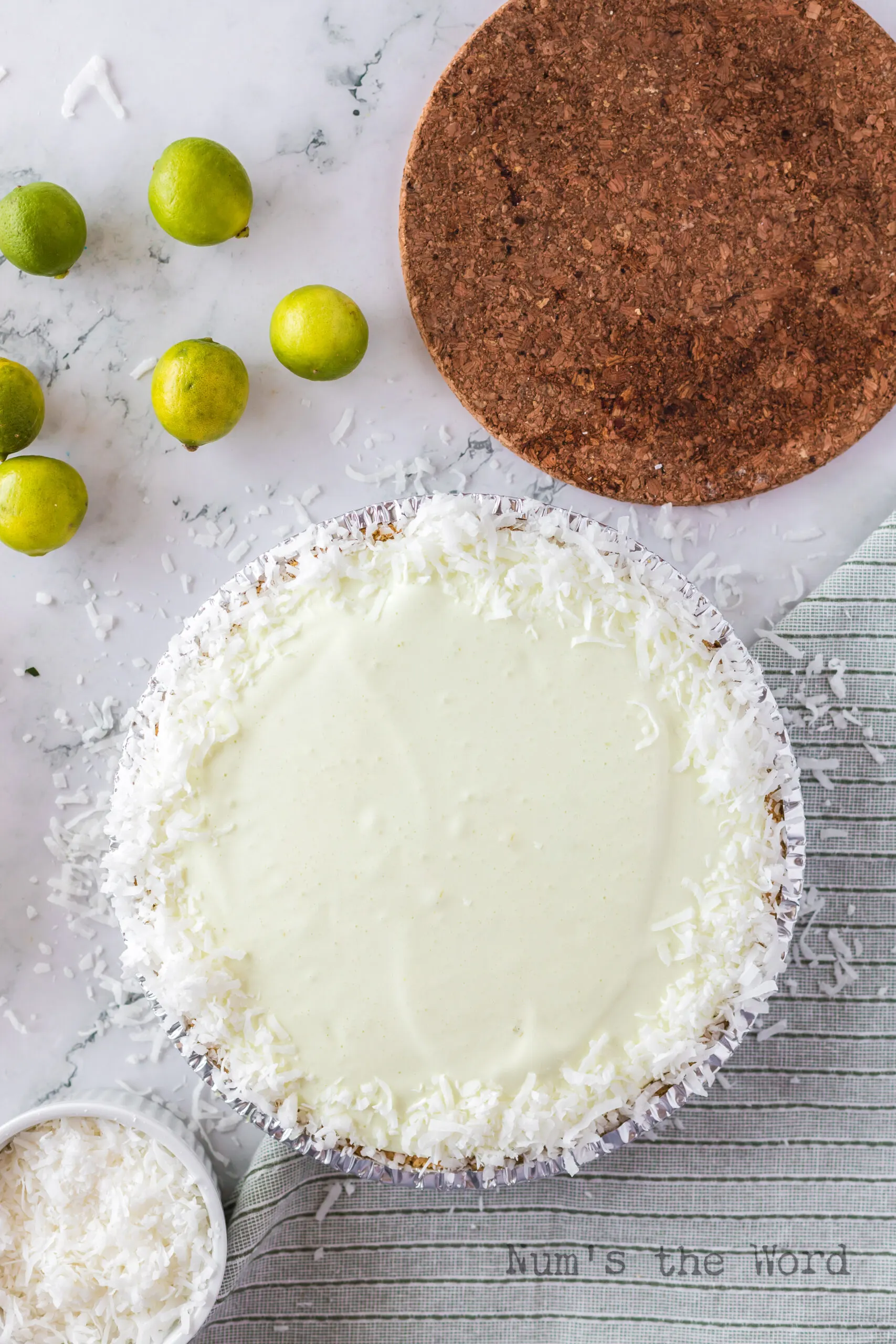 Shredded coconut lining the edges of chiffon pie