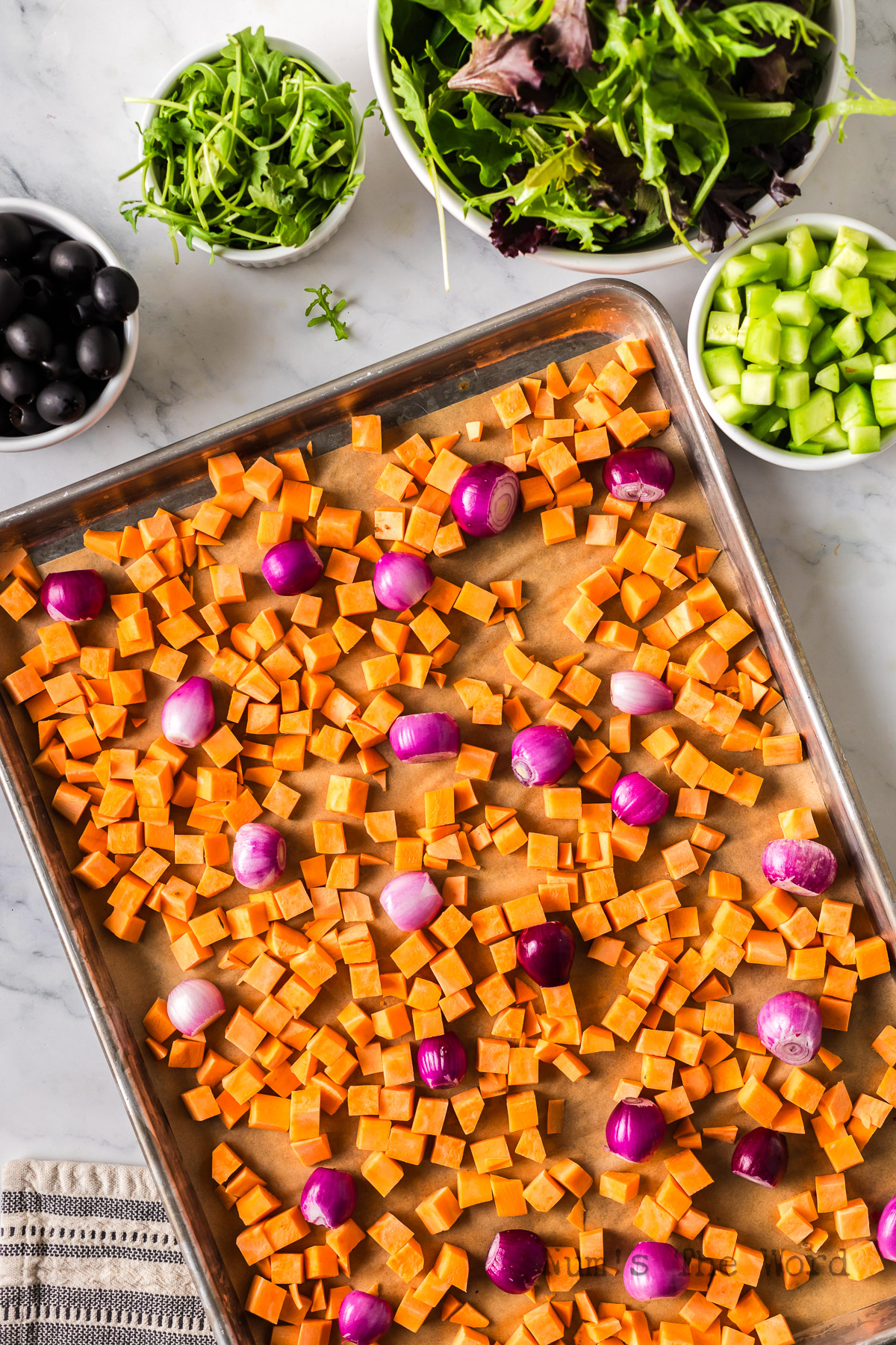 Cubed sweet potatoes and red pearl onions