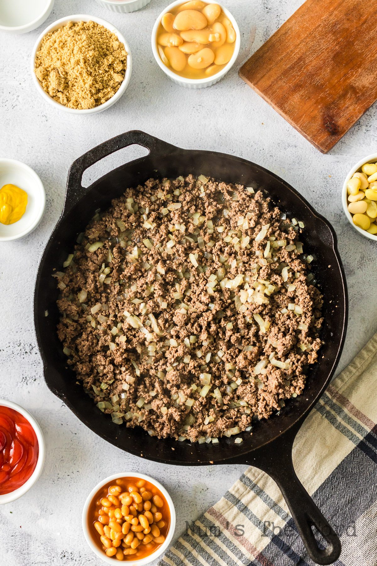 ground beef and onions cooked in skillet