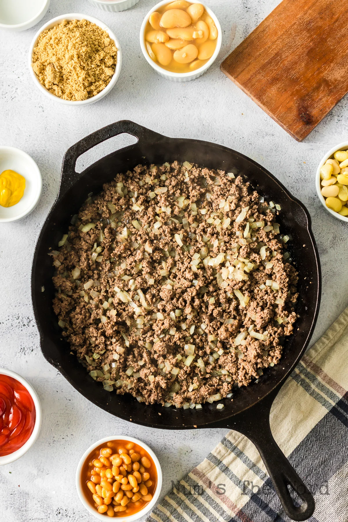 ground beef and onions cooked in skillet