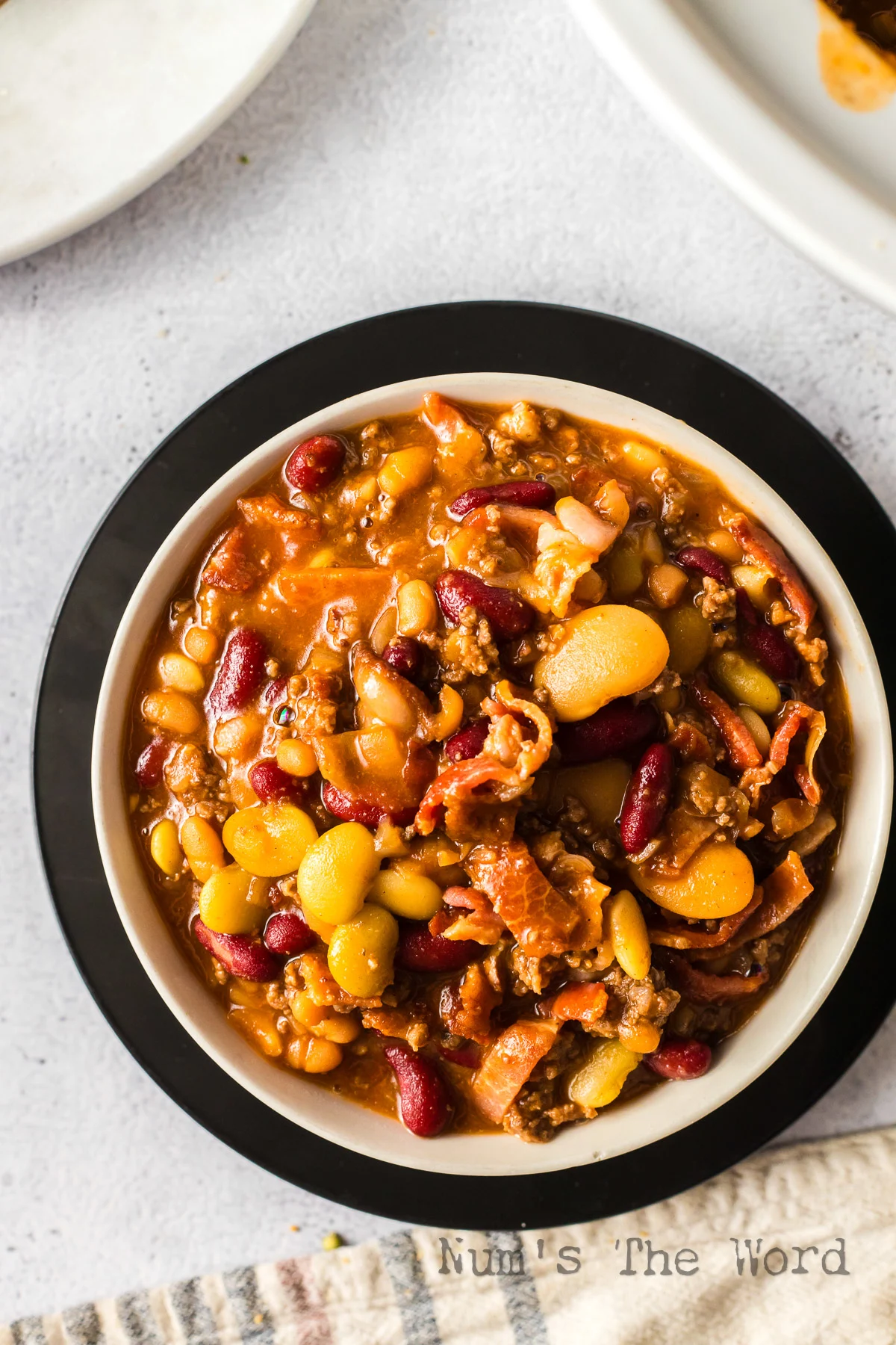 zoomed in image of calico beans in a bowl