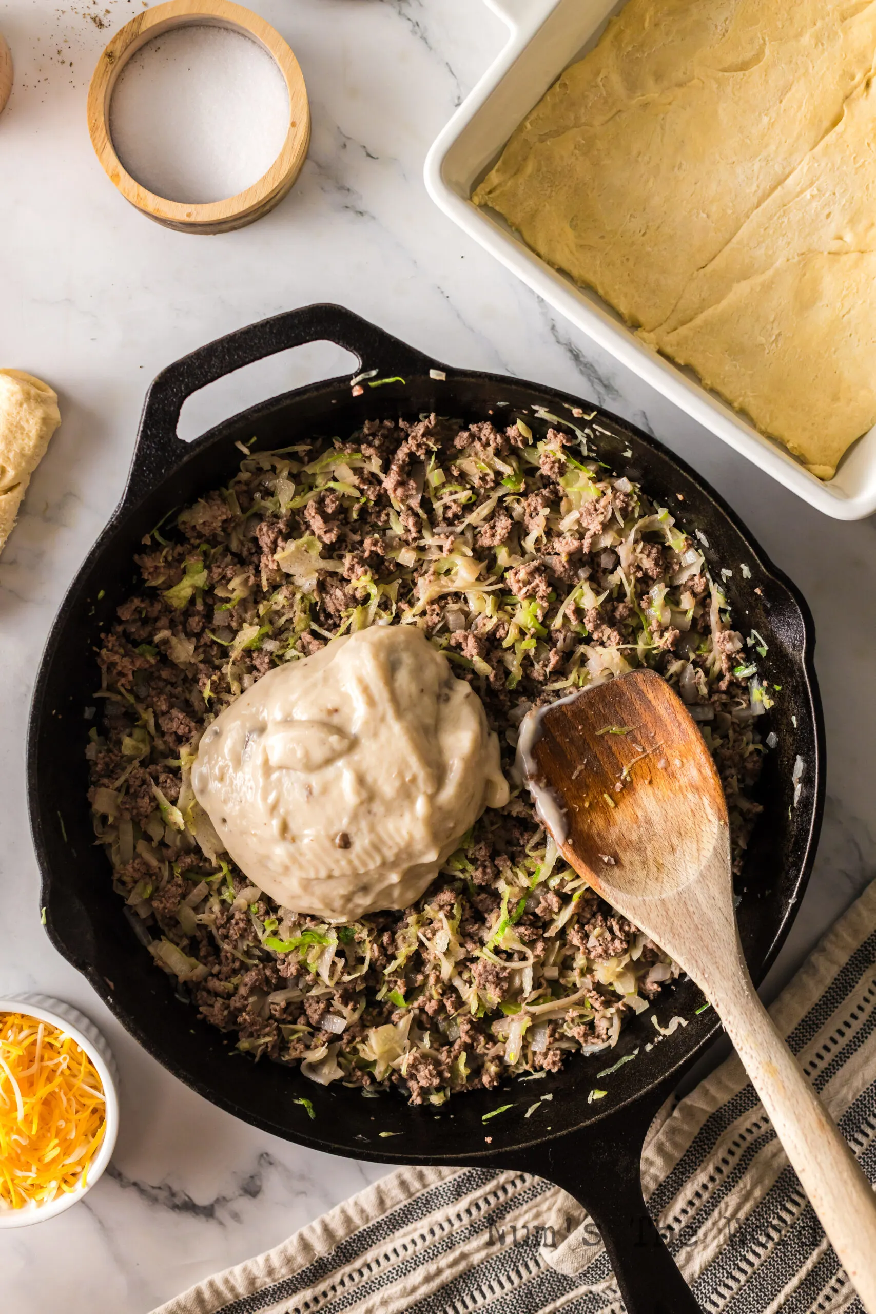 Cream of mushroom soup added to beef and cabbage mixture.