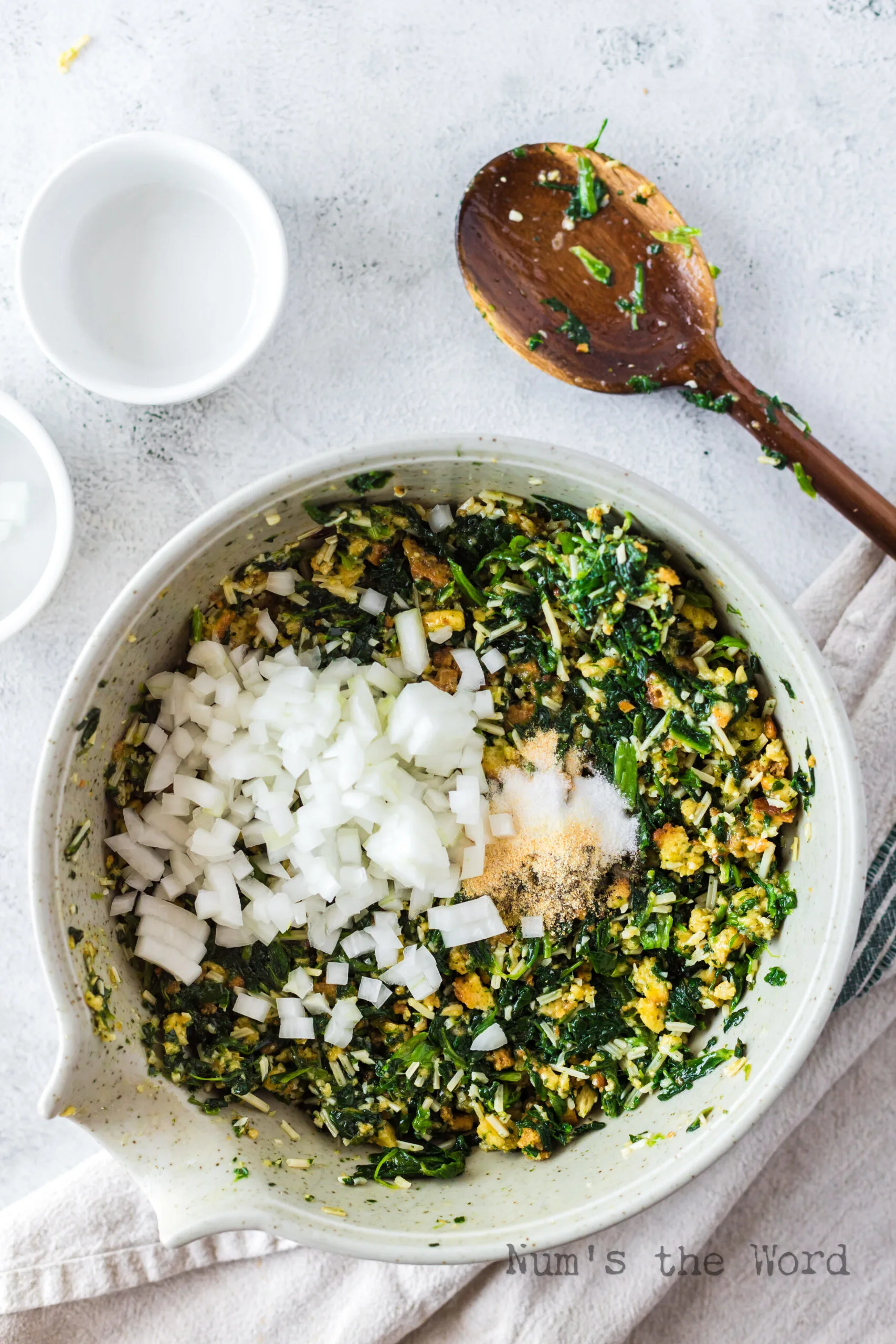 black pepper onion and garlic added to spinach mixture.