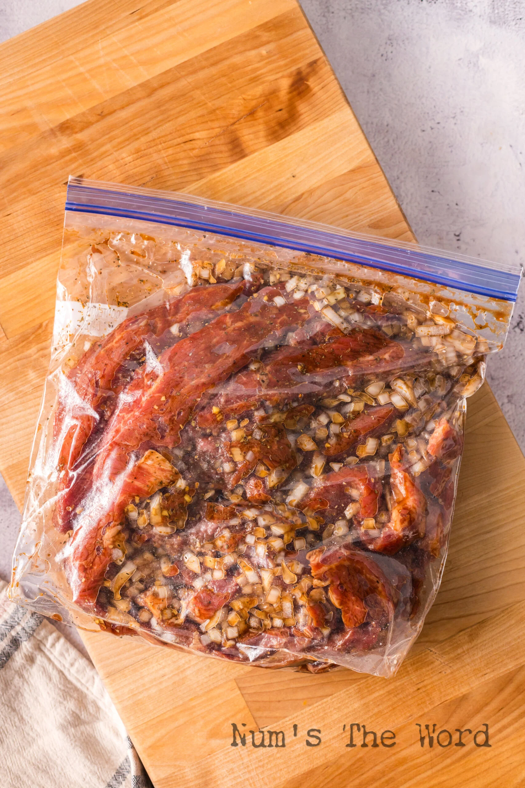 meat and marinade in a zipper bag ready to sit.