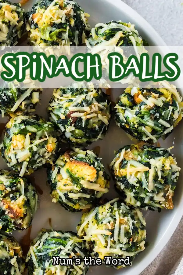 Main image of baked spinach balls laid out on a platter.