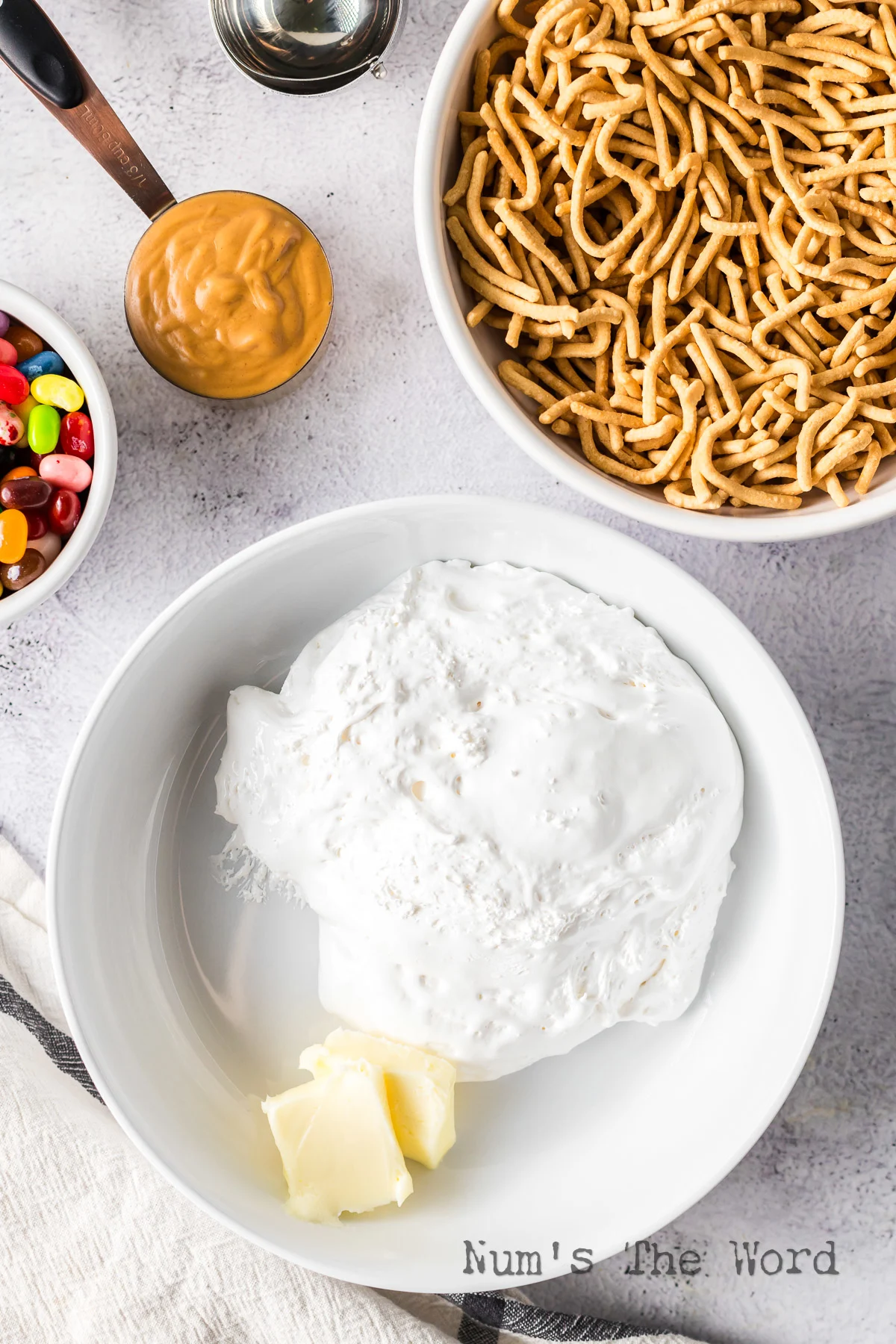 Marshmallow cream and butter in a bowl.