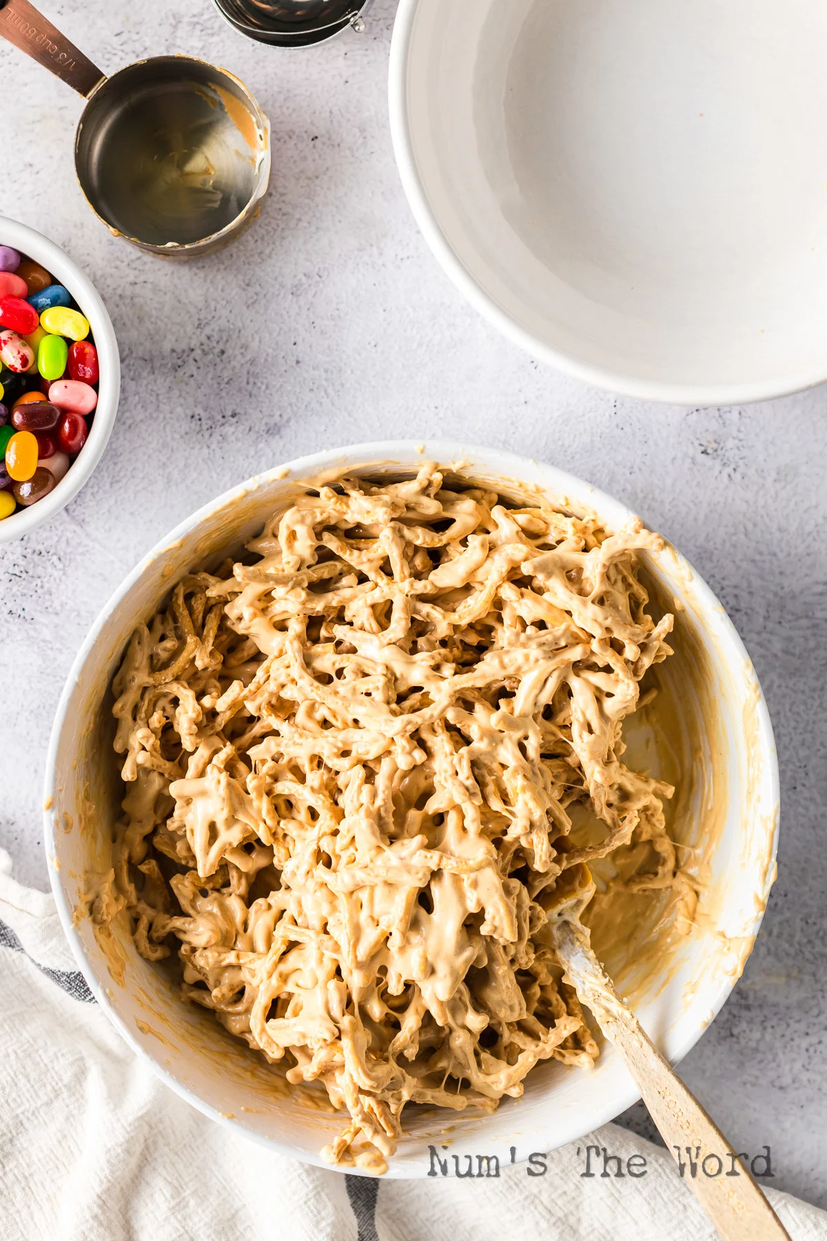 chow mein marshmallow treats mixed up in a bowl.