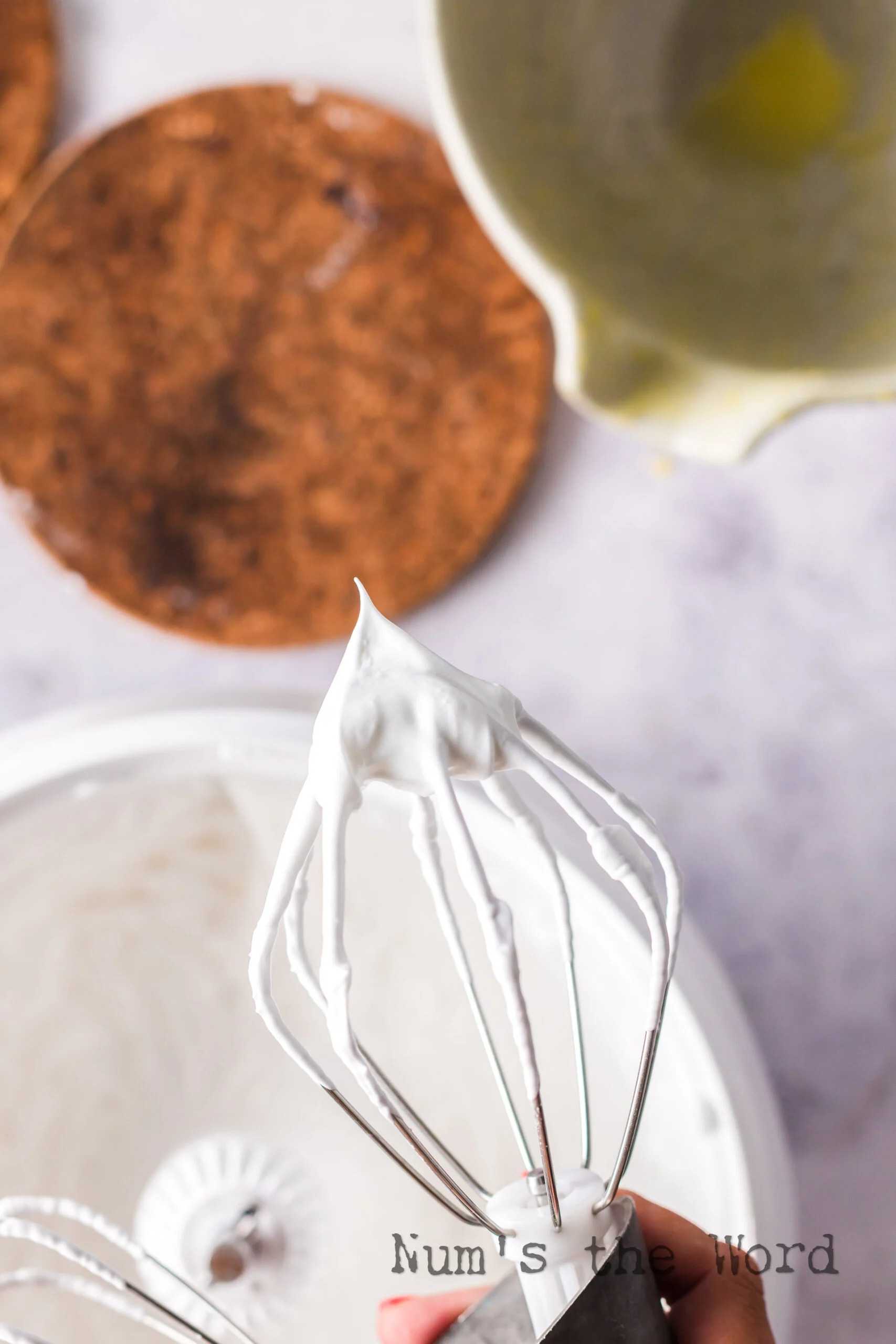 Meringue whipped up to stiff peaks.