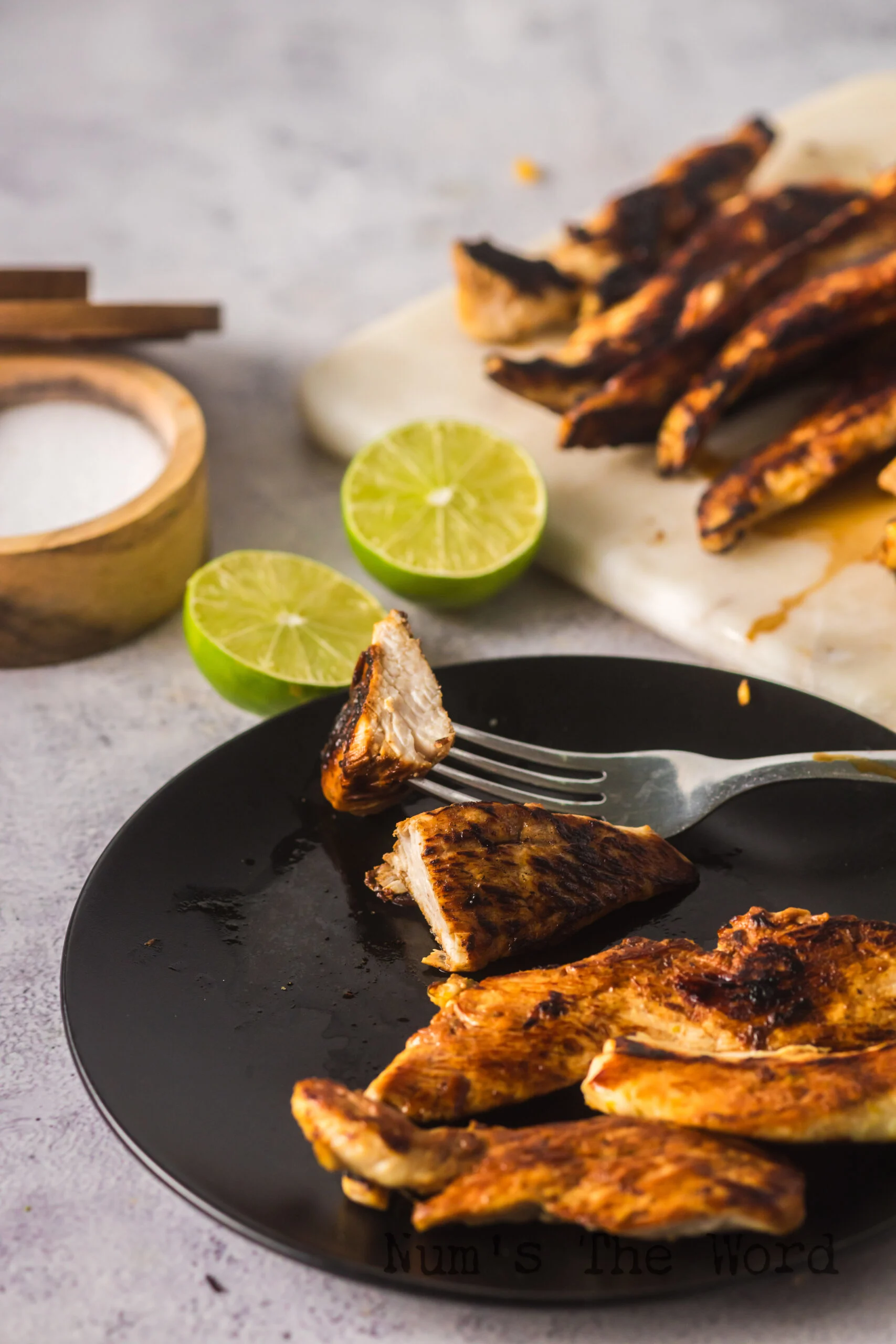 zoomed out image of chicken on a plate.