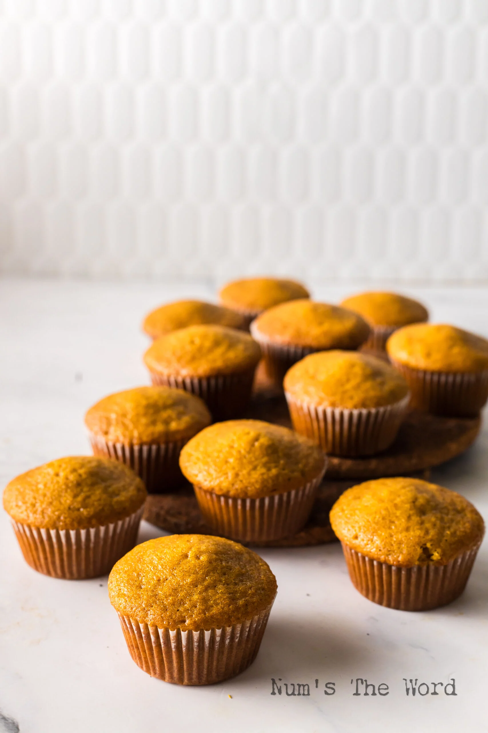 muffins laid out on the counter, ready to eat.