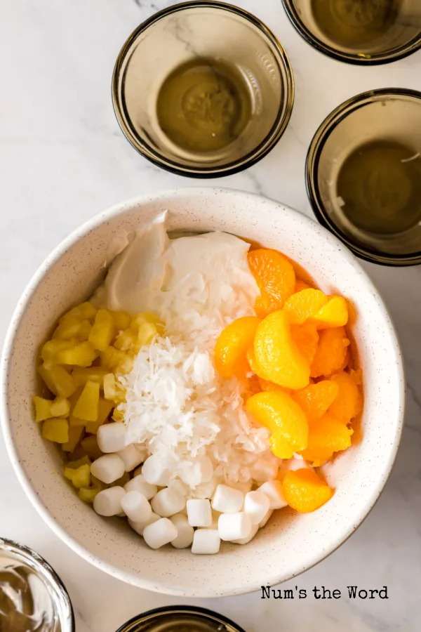 All 5 ingredients placed in a bowl, unmixed.