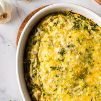 zoomed in image of frittata in casserole dish ready to serve.