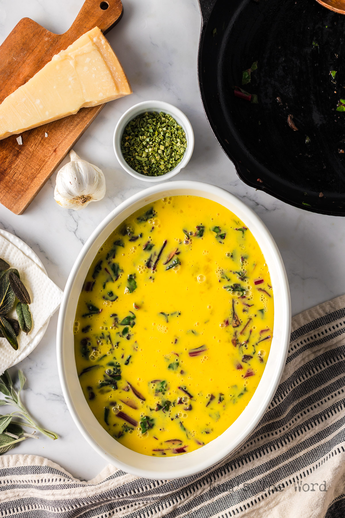 Eggs poured over mushrooms and swiss chard.