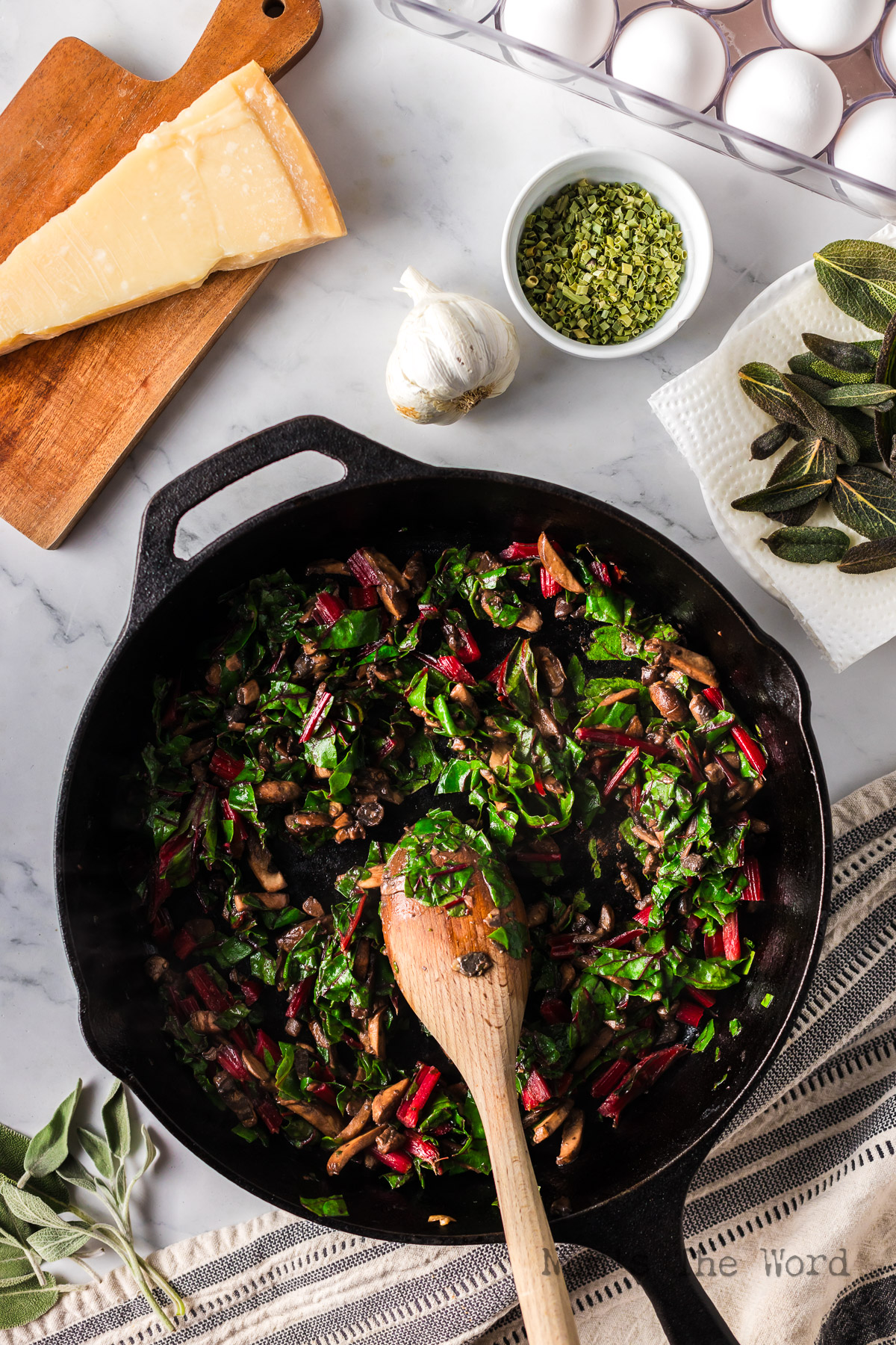 swiss chard cooking in skillet.