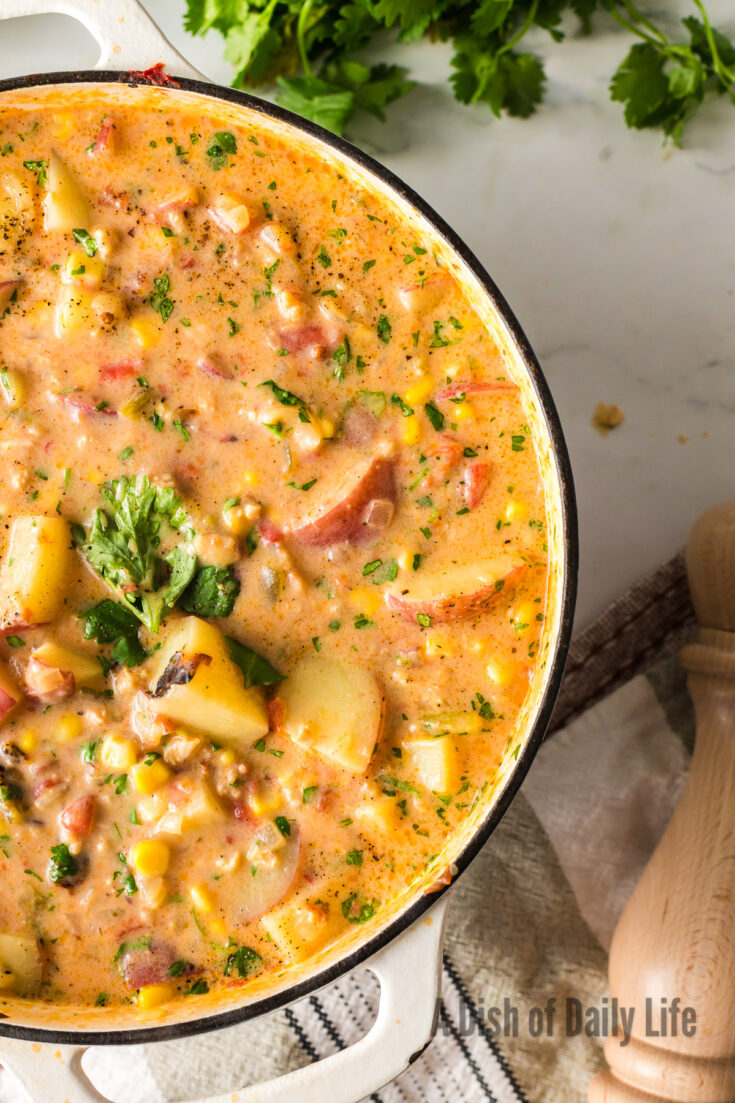 Cooked clam chowder in a large pot.