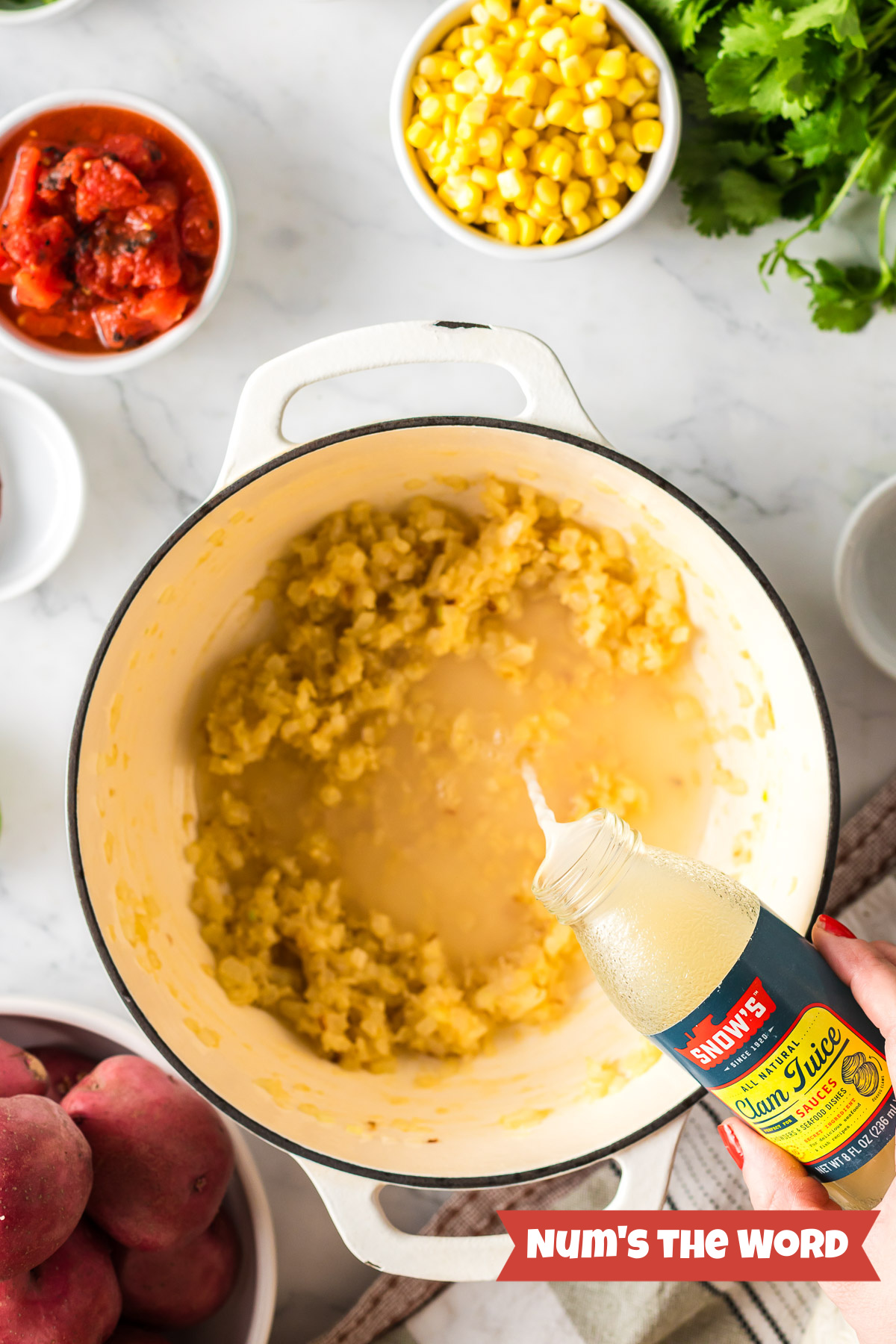 Clam juice added to onion and flour mixture.